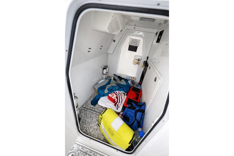 Slide: The Image of Interior of a 2023 Freeman 43 boat cabin with storage and equipment. - 20