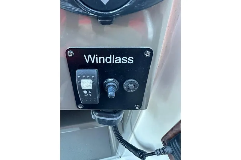 Slide: The Image of Control panel for windlass on 2014 Rinker 260 Express Cruiser boat. - 12