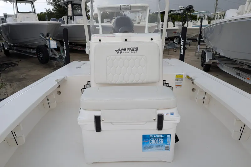 Slide: The Image of 2027 Hewes Redfisher 18 boat interior with Engel cooler and seating. - 14