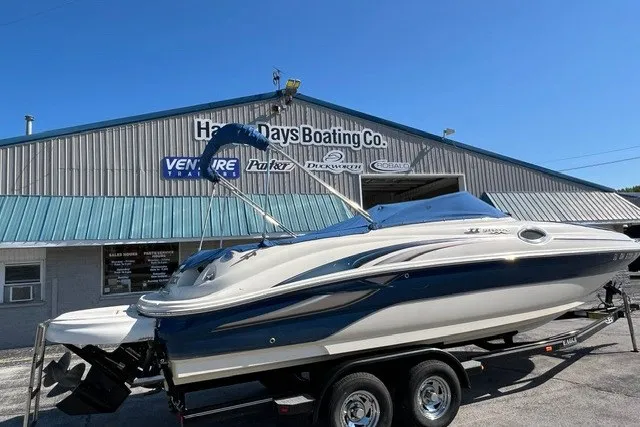Slide: The Image of 2003 Sea Ray 240 Sundeck boat on trailer at Happy Days Boating Co. - 1