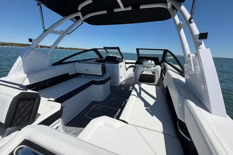 Slide: The Image of Luxurious interior of 2027 Cobalt R6 Outboard boat on open water. - 8