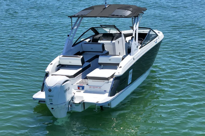 Slide: The Image of 2027 Cobalt R6 Outboard boat on clear water, featuring sleek design and modern amenities. - 1