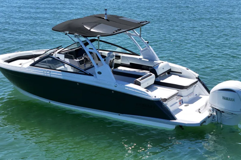 Slide: The Image of 2027 Cobalt R6 Outboard boat on clear blue water, featuring sleek design and Yamaha engine. - 3