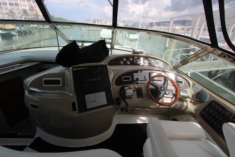 Slide: The Image of Cockpit of 2001 Sea Ray Sundancer 460 yacht with Garmin navigation system. - 9