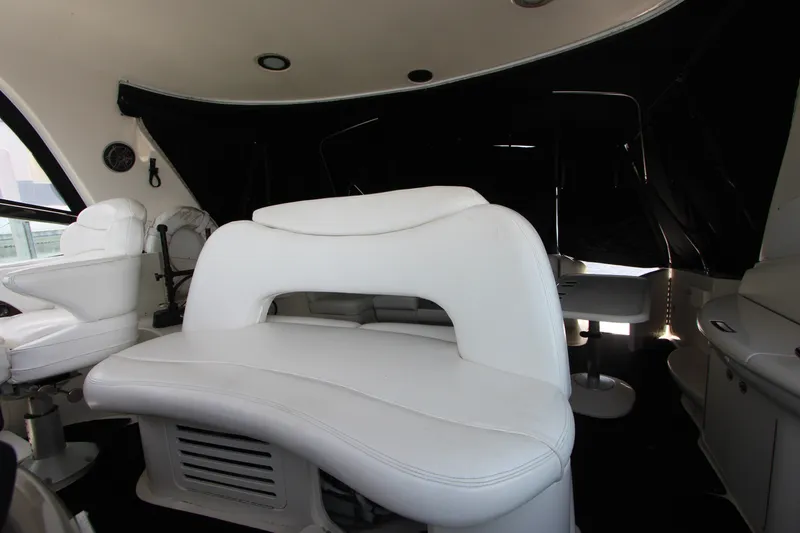 Slide: The Image of Interior of 2001 Sea Ray Sundancer 460 yacht with white leather seating. - 7