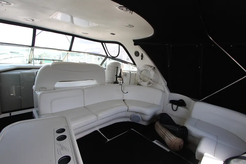 Slide: The Image of Luxurious interior of a 2001 Sea Ray Sundancer 460 yacht with white seating. - 5