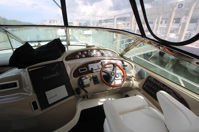 Slide: The Image of Cockpit of 2001 Sea Ray Sundancer 460 yacht with Garmin navigation system. - 8