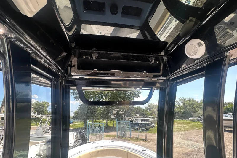 Slide: The Image of 2026 Sportsman Open 232 Center Console interior view with modern design features. - 32