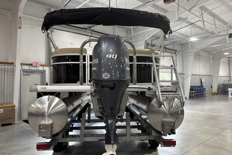 Slide: The Image of 2027 Godfrey XPERIENCE 2086 pontoon boat with Yamaha 90 engine in a warehouse. - 20