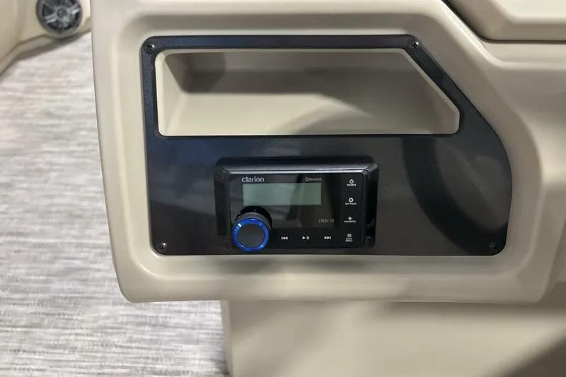 Slide: The Image of Clarion Bluetooth stereo system in 2027 Godfrey XPERIENCE 2086 boat dashboard. - 13