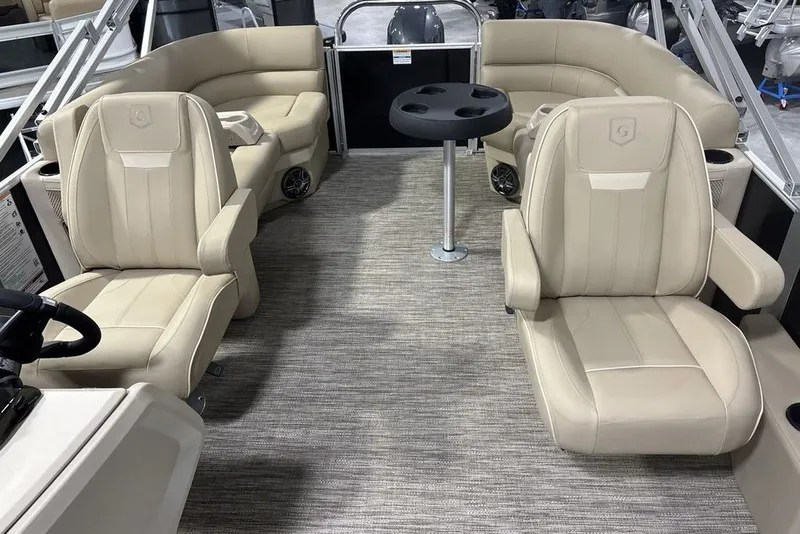 Slide: The Image of Luxurious interior of 2027 Godfrey XPERIENCE 2086 pontoon boat with beige seating. - 14