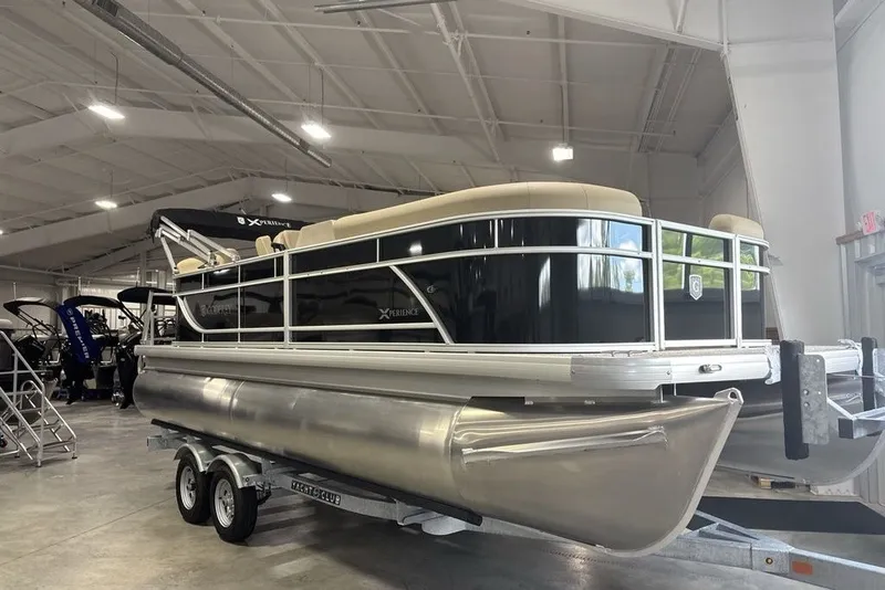 Slide: The Image of 2027 Godfrey XPERIENCE 2086 pontoon boat in showroom, on trailer. - 2