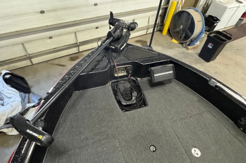 Slide: The Image of 2021 Nitro ZV19 Sport boat interior with trolling motor and Humminbird fish finder. - 15