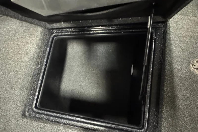 Slide: The Image of Open storage compartment in 2021 Nitro ZV19 Sport boat. - 18