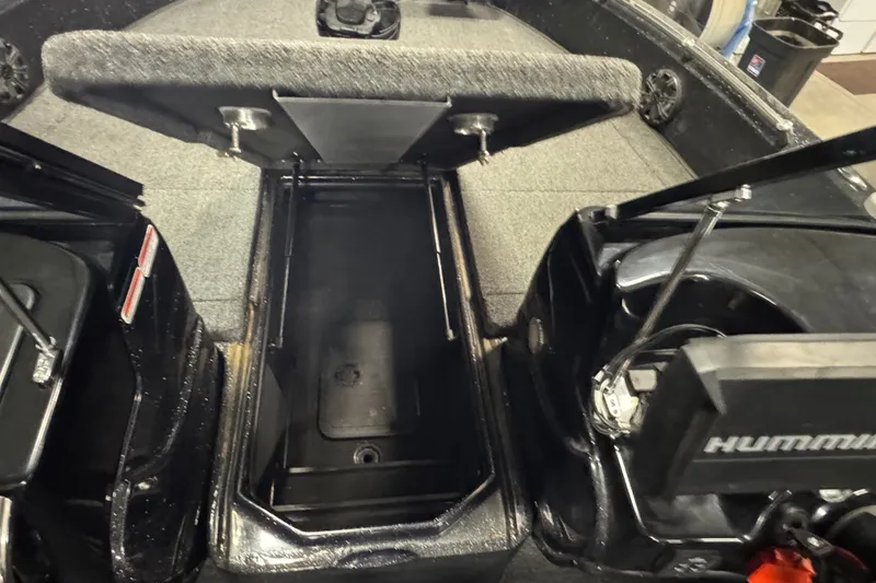 Slide: The Image of Open storage compartment in 2021 Nitro ZV19 Sport boat interior. - 14