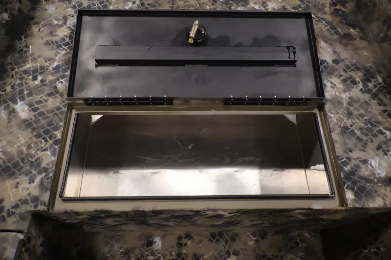 Slide: The Image of Open storage compartment in 2025 Excel 1651 River Warrior SC boat. - 13