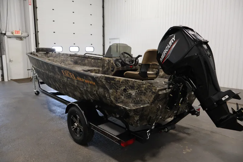 Slide: The Image of 2025 Excel 1651 River Warrior SC boat with Mercury engine in a garage. - 7