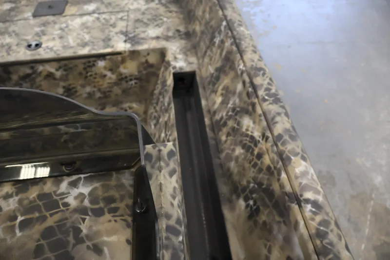 Slide: The Image of 2025 Excel 1651 River Warrior SC boat with camouflage pattern detail. - 19