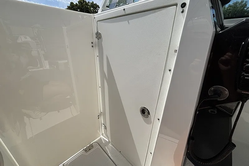 Slide: The Image of 2023 Blackfin 272 DC boat interior door with sleek design and modern finish. - 22