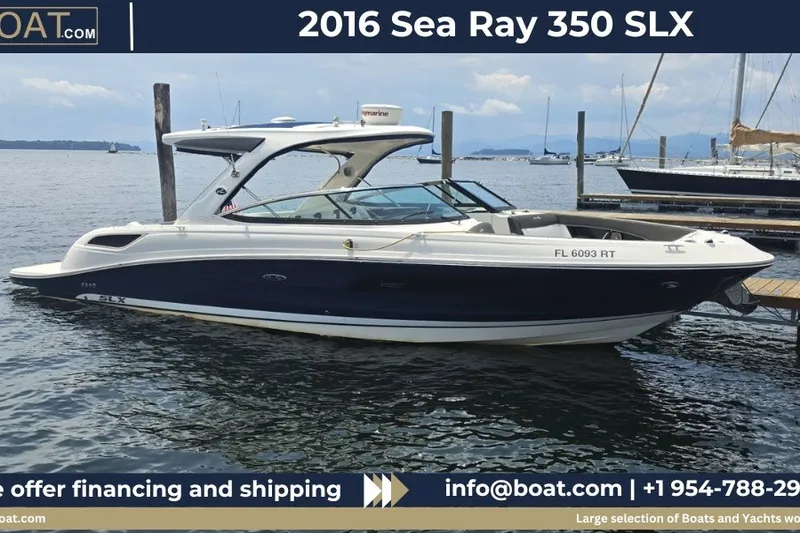 The Image of 2016 Sea Ray SLX 350 boat docked on calm water, showcasing sleek design and luxury features. - 0