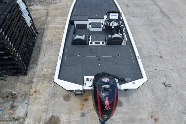 Slide: The Image of 2023 Vexus AVX1980 boat with Mercury 150 engine, viewed from above on concrete surface. - 3