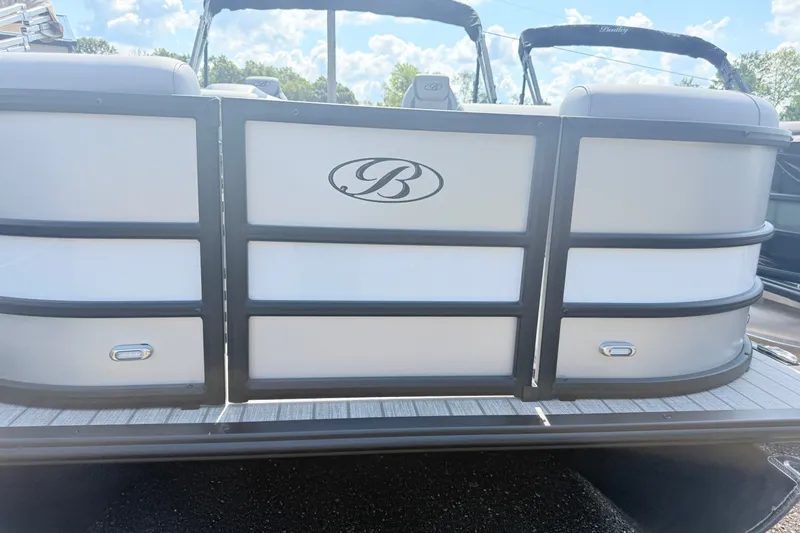 Slide: The Image of 2027 Bentley Pontoons Legacy 200 Navigator, rear view, sleek design, sunny day. - 1