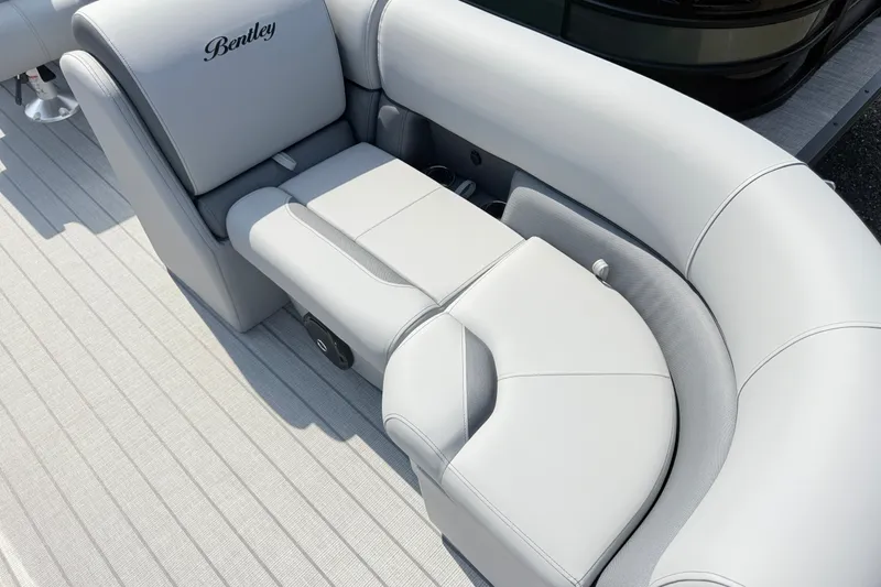 Slide: The Image of Luxurious seating on 2027 Bentley Pontoons Legacy 200 Navigator, featuring elegant gray upholstery. - 6
