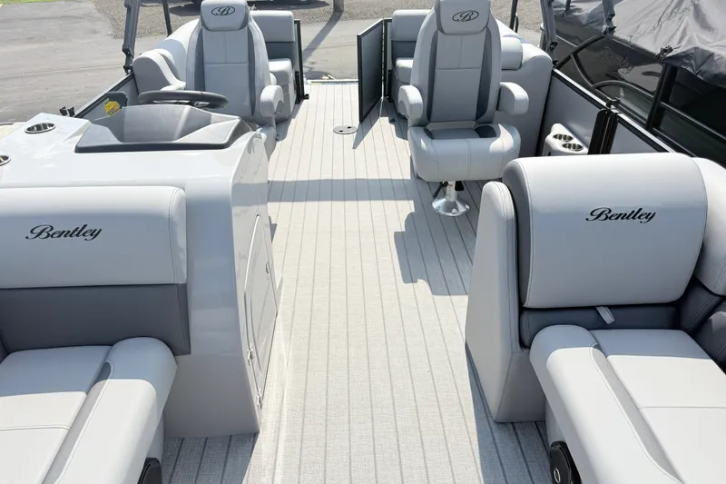 Slide: The Image of 2027 Bentley Pontoons Legacy 200 Navigator interior with luxurious seating and modern design. - 7