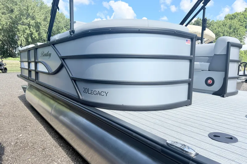 Slide: The Image of 2027 Bentley Pontoons Legacy 200 Navigator, sleek design, docked on a sunny day. - 3