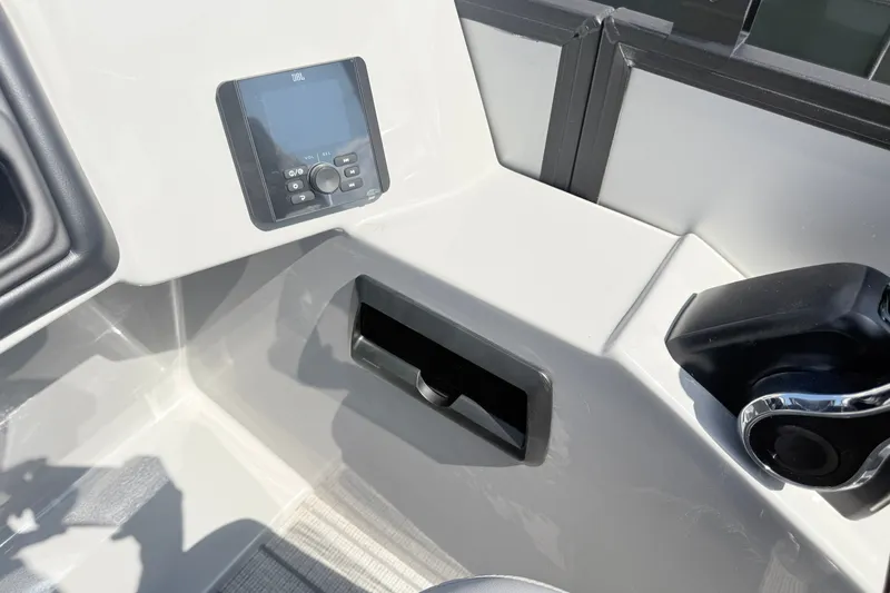 Slide: The Image of Control panel of 2027 Bentley Pontoons Legacy 200 Navigator with modern dashboard features. - 11