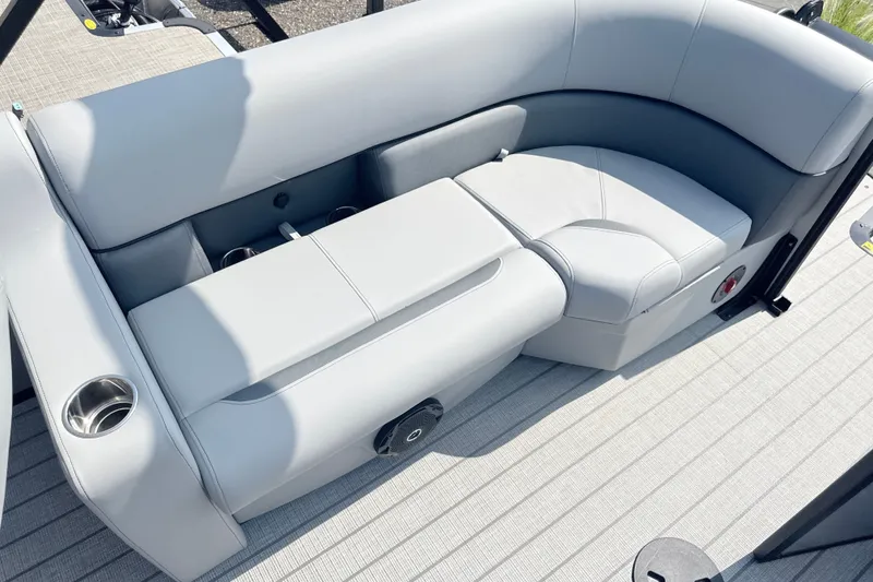 Slide: The Image of 2027 Bentley Pontoons Legacy 200 Navigator interior seating with cup holder and modern design. - 16