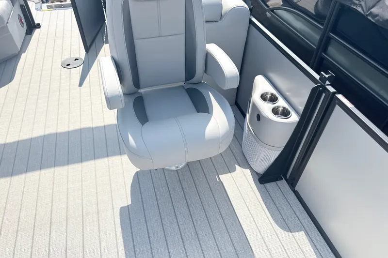 Slide: The Image of 2027 Bentley Pontoons Legacy 200 Navigator interior with plush seating and cup holders. - 8