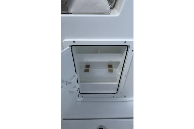 Slide: The Image of Open storage compartment on 2027 Sea Hunt Gamefish 25 boat. - 18