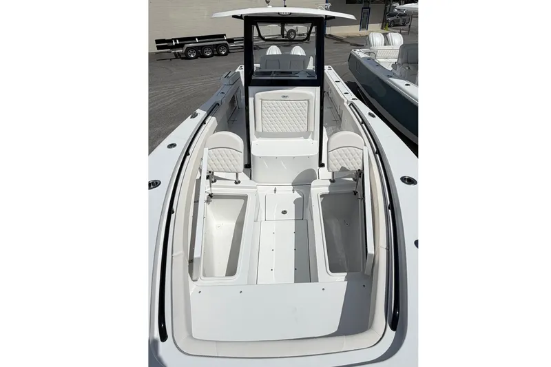 Slide: The Image of 2027 Sea Hunt Gamefish 25 boat with spacious seating and modern design. - 23