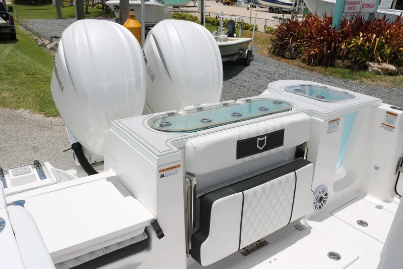 Slide: The Image of 2027 Sea Fox 288 Commander boat with dual Yamaha engines and sleek seating design. - 19