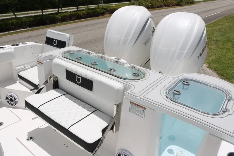 Slide: The Image of 2027 Sea Fox 288 Commander boat with dual Yamaha engines and luxurious seating. - 20