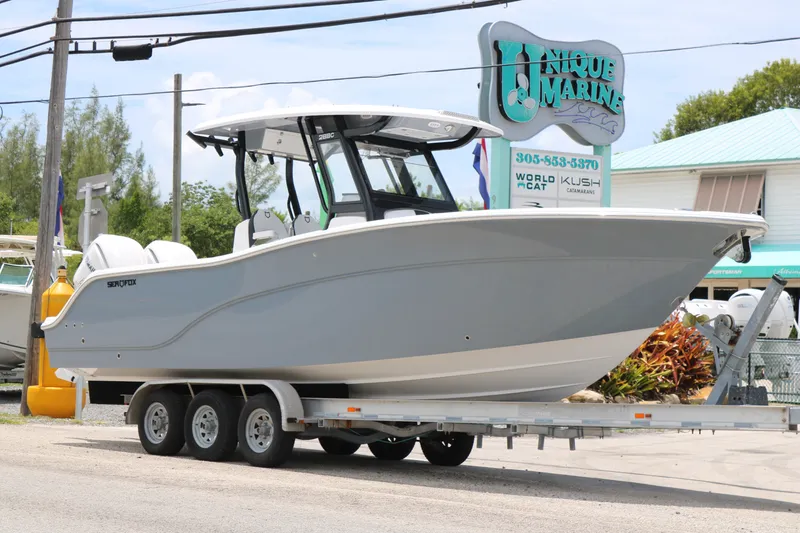 The Image of 2027 Sea Fox 288 Commander boat on a trailer at Unique Marine dealership. - 0