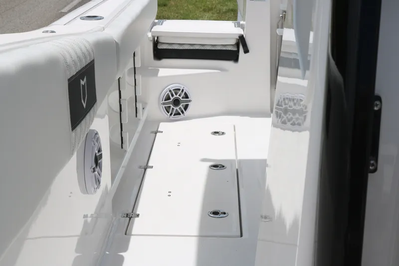 Slide: The Image of Interior view of 2027 Sea Fox 288 Commander boat, featuring sleek design and built-in speakers. - 17