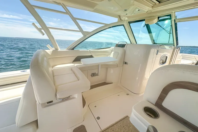 Slide: The Image of Interior of 2015 Grady-White Freedom 375 boat with luxurious seating and ocean view. - 25