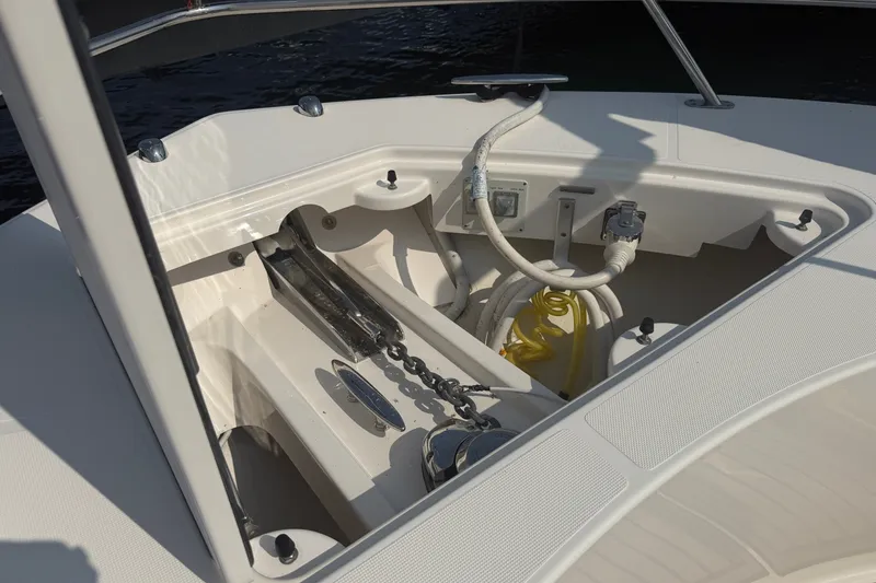 Slide: The Image of 2016 Tiara Yachts Q44 anchor locker with chain and hose storage. - 51