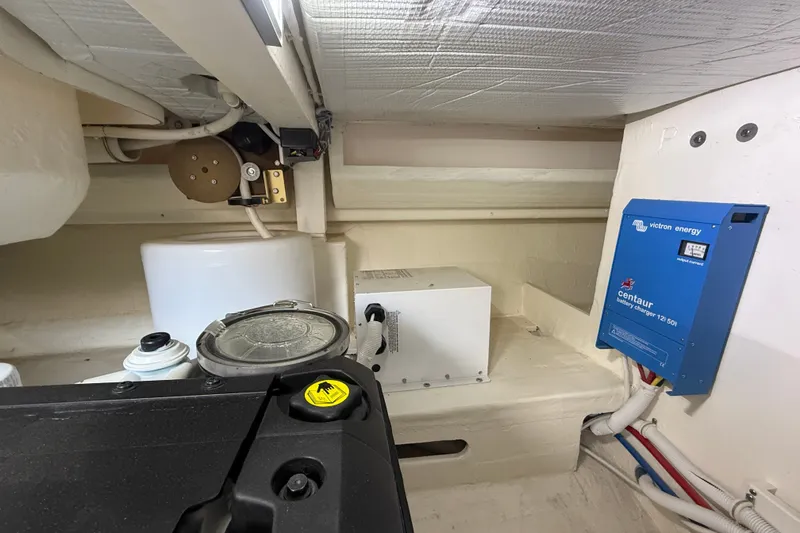 Slide: The Image of Engine room of 2016 Tiara Yachts Q44 with Victron Energy Centaur battery charger. - 57