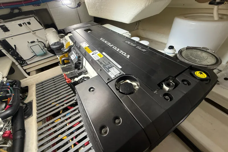Slide: The Image of Engine room of 2016 Tiara Yachts Q44 featuring Volvo Penta IPS 600 engine. - 54