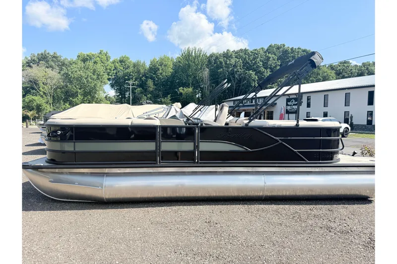 The Image of 2026 Bentley Pontoons Legacy 220 Navigator on display, featuring sleek design and modern amenities. - 0