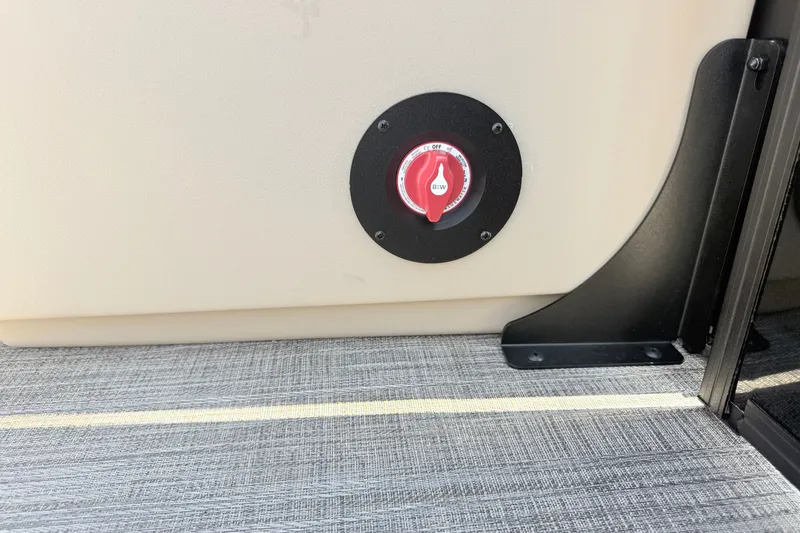 Slide: The Image of 2026 Bentley Pontoons Legacy 220 Navigator interior detail with red control knob. - 7
