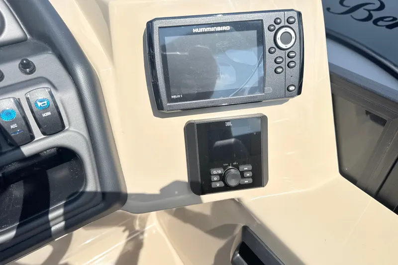 Slide: The Image of Control panel of 2026 Bentley Pontoons Legacy 220 Navigator with Humminbird and JBL systems. - 20