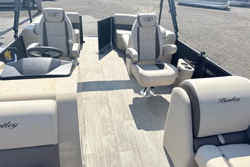 Slide: The Image of 2026 Bentley Pontoons Legacy 220 Navigator interior with luxurious seating and modern design. - 15