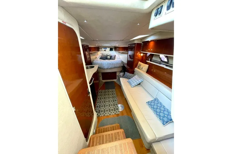 Slide: The Image of Luxurious interior of 2008 Sea Ray Sundancer 330 yacht with cozy seating and elegant decor. - 16