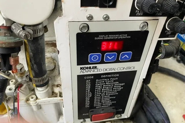 Slide: The Image of Kohler advanced digital control panel on a 2008 Sea Ray Sundancer 330 boat. - 32