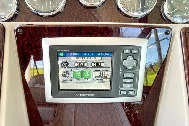 Slide: The Image of SmartCraft display on 2008 Sea Ray Sundancer 330 dashboard showing vessel status. - 30
