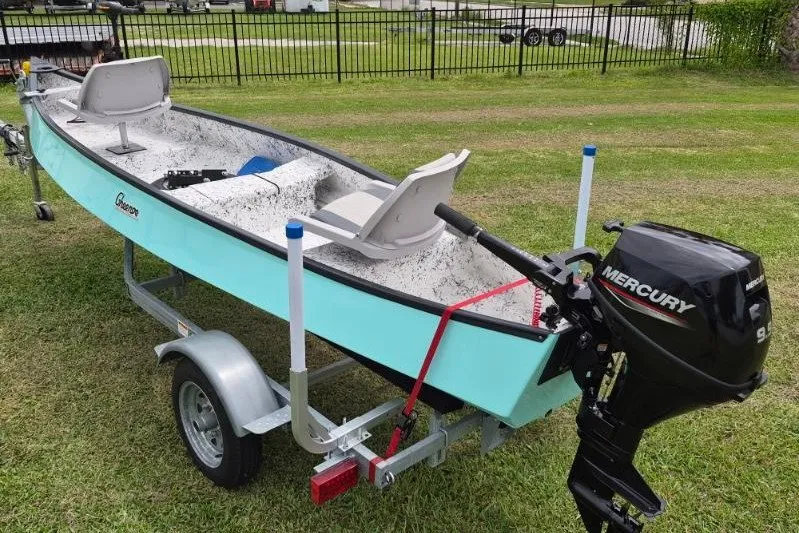 Slide: The Image of 2022 Gheenoe NMZ 15.4 boat on trailer with Mercury outboard motor. - 6